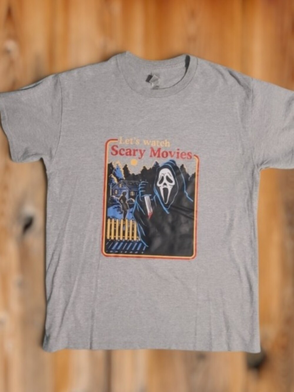 💥 Let’s Watch Scary Movies Graphic Tee - Gray M